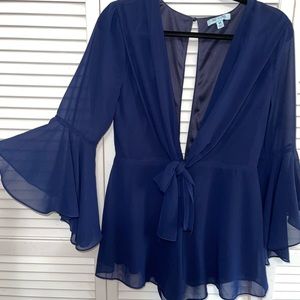 A Navy blue, deep v romper